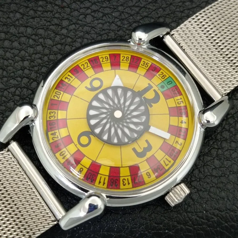 Vintage 1971 Roulette Manual Mens Silver Watch W/Steel Strap & Yellow accents